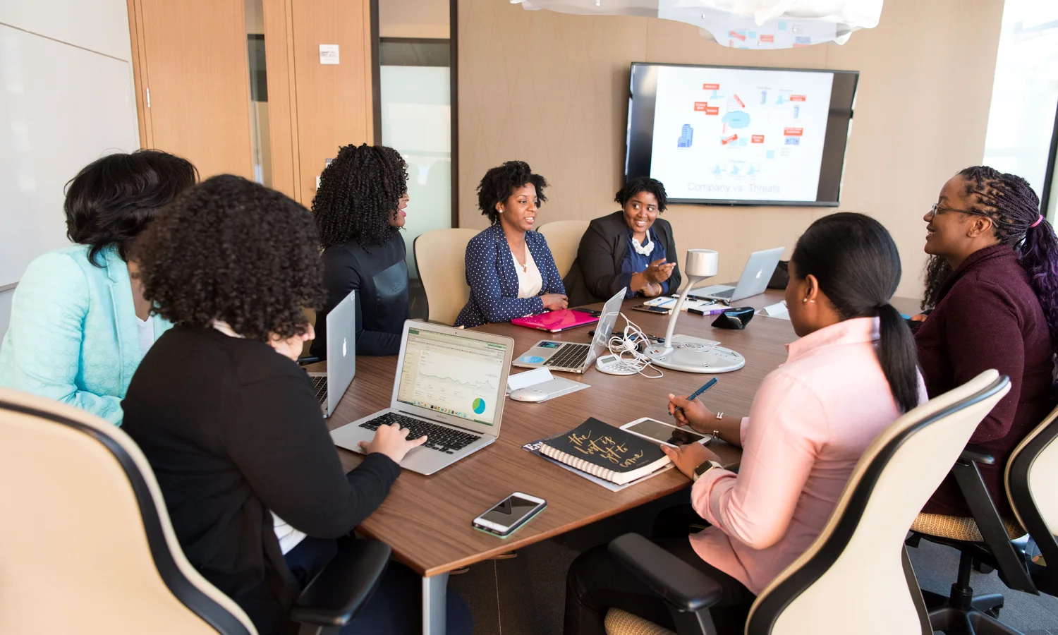 A diverse team discussing ideas during a business meeting