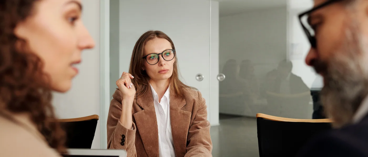 Professionals participating in a business meeting